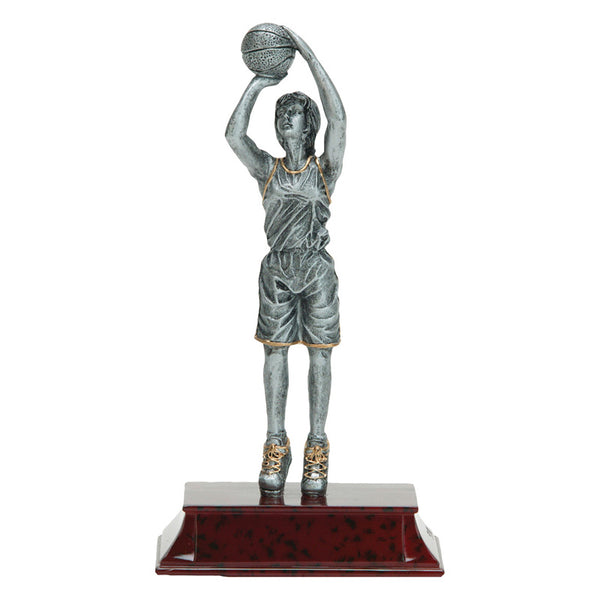 Basketball trophy featuring a silver female basketball player making a jump shot with the basketball raised above his head.