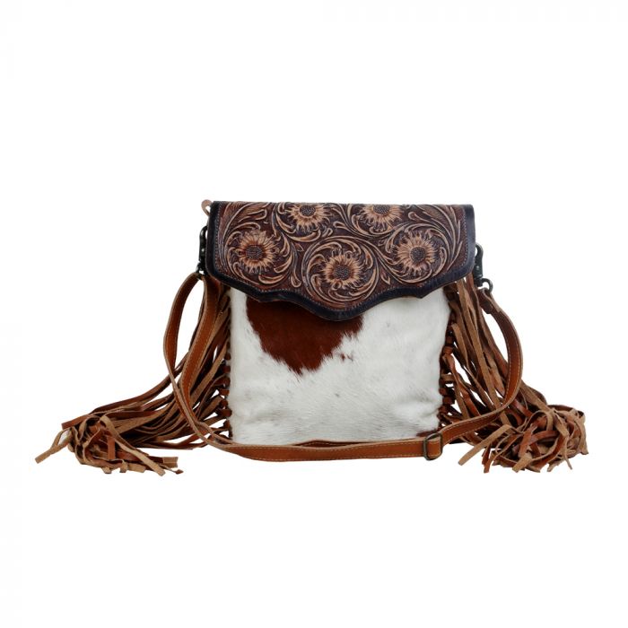 Tooled leather cow hide store cross body